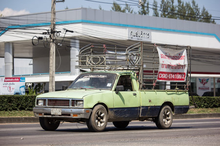 Chiangmai, Thailand -  October 28 2019:  Private Isuzu KB Old Pickup car. Photo at road no 121 about...