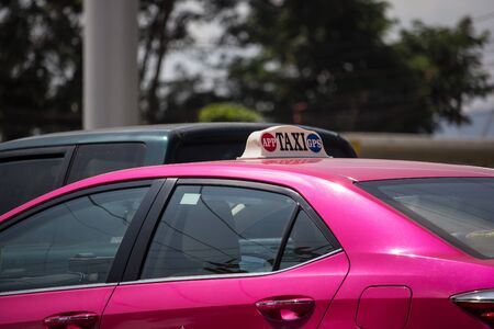 Chiangmai, Thailand -  October 29 2019: Pink City taxi Bangkok, Service in city. On road no.1001, 8 km from Chiangmai city.のeditorial素材