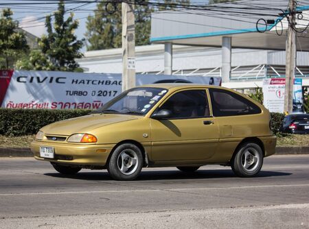 Chiangmai, Thailand - November 21 2019: Private Sedan Car Ford Festiva American motors Car. On road no.1001, 8 km from Chiangmai city.のeditorial素材