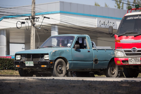 Chiangmai, Thailand - November 25 2019:   Private Isuzu KB Old Pickup car. Photo at road no 121...