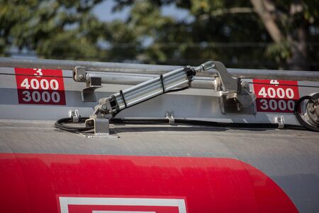 Chiangmai, Thailand - December 16 2019: Oil Truck of MeungLuang Oil transport Company. On Truck on road no.1001, 8 km from Chiangmai city.のeditorial素材