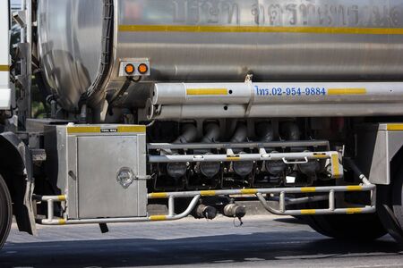 Chiangmai, Thailand - December 16 2019: Oil Truck of MeungLuang Oil transport Company. On Truck on road no.1001, 8 km from Chiangmai city.のeditorial素材