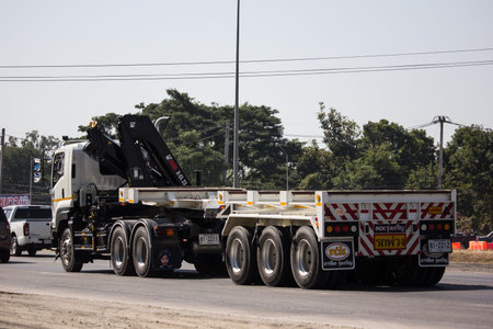 Chiangmai, Thailand - December 19 2019: Isuzu Truck with crane of Lumphun Phatthana Company. Photo...