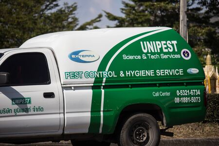 Chiangmai, Thailand - December 2 2019: Pick up truck of Unipest company. Service for control pest in home and Building. Photo at road no.1001 about 8 km from city center, thailand.のeditorial素材