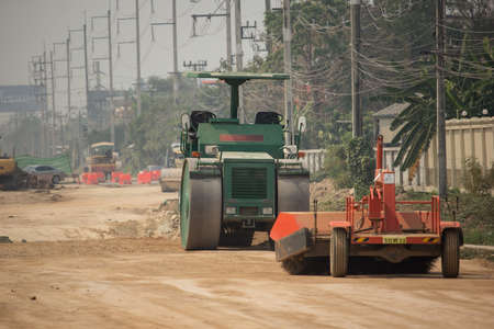 Chiangmai, Thailand - March  12 2020:  Sakai road roller on Construction site. Photo of new road no.121 outside ring road of chiangmai city.のeditorial素材