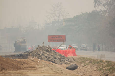 Chiangmai, Thailand - March  15 2020: Smoke and Pollution Haze on highway Chiangmai road. On March 15 Aqi of Chiangmai city  is 1 of city Pollution rank.のeditorial素材