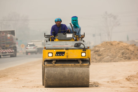 Chiangmai, Thailand - March  15 2020: Sakai road roller on Construction site. Photo of new road...