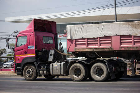 Chiangmai, Thailand - March  6 2020: Trailer Dump truck of Thanachai Company. On road no.1001, 8 km from Chiangmai city.のeditorial素材