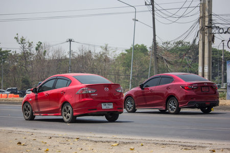 Chiangmai, Thailand - March  24 2020: Private Eco car Mazda 2. On road no.1001 8 km from Chiangmai...