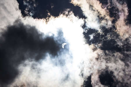 The earth covers the sun in a beautiful solar eclipseの写真素材