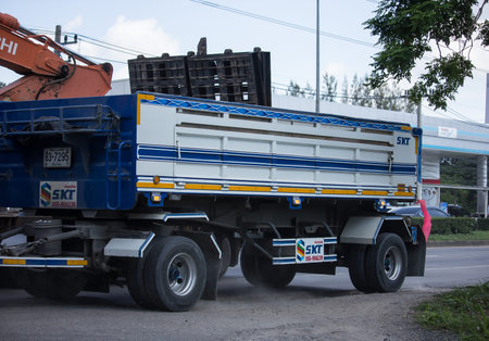 Chiangmai, Thailand -   July 16 2020: Private Isuzu Dump Truck. On road no.1001 8 km from Chiangmai...