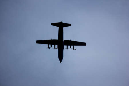 Big Military Transport Cargo Aircraft over skyの写真素材