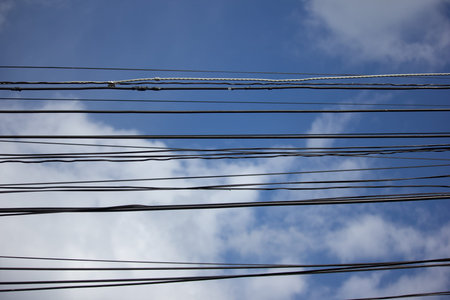 Close up Eletricity line with blue sky background