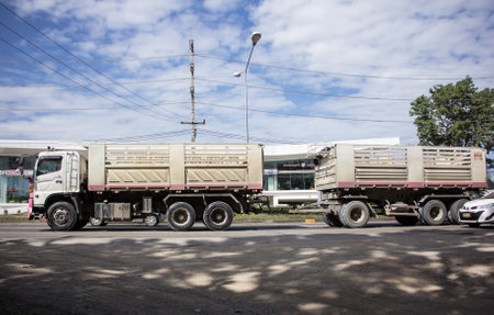 Chiangmai, Thailand -   November 13 2020: Trailer Dump truck of Thanachai Company. On road no.1001, 8 km from Chiangmai city.のeditorial素材