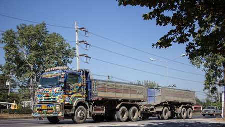 Chiangmai, Thailand - December 24 2020:  Private Isuzu Dump Truck. On road no.1001 8 km from Chiangmai Business Area.のeditorial素材