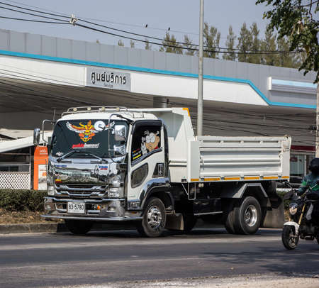 Chiangmai, Thailand - January 19 2021: 
 Private Isuzu Dump Truck. On road no.1001 8 km from Chiangmai Business Area.のeditorial素材