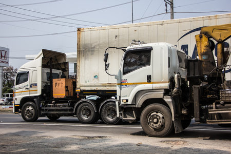 Chiangmai, Thailand - February  9 2021: Private Isuzu Crane Truck. On road no.1001 8 km from Chiangmai Business Area.のeditorial素材