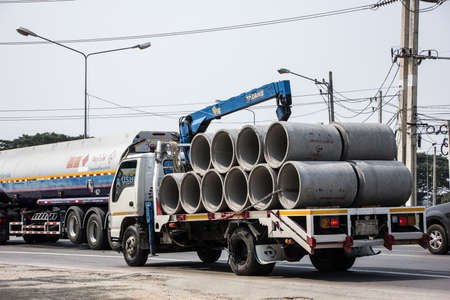 Chiangmai, Thailand - February  9 2021:  Private Isuzu Crane Truck. On road no.1001 8 km from Chiangmai Business Area.のeditorial素材