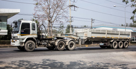 Chiangmai, Thailand - February  9 2021:  Private Isuzu Dump Truck. On road no.1001 8 km from...