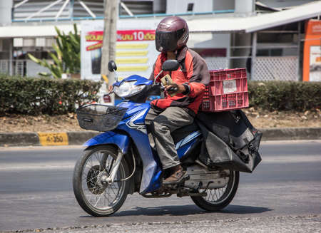 Chiangmai, Thailand - March  4 2021: J and T Mini Container Motorcycle. Photo at road no 121 about 8 km from downtown Chiangmai, thailand.のeditorial素材