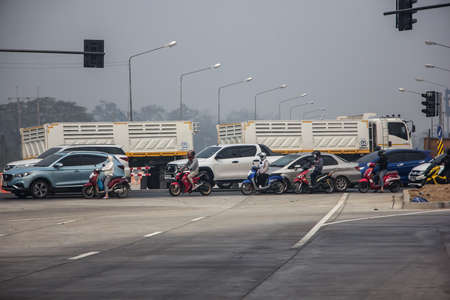 Chiangmai, Thailand - March  11 2021:  Car on Junction. Road to chiangmai city.のeditorial素材