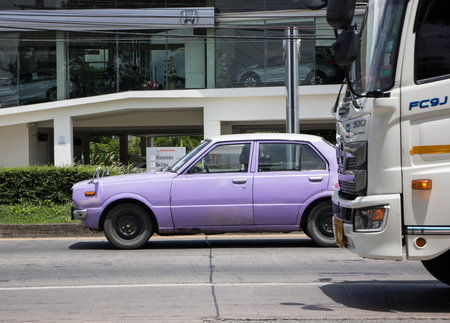 Chiangmai, Thailand -July 14 2021:  Private Old car, Toyota Corolla. Photo at road no 121 about 8 km from downtown Chiangmai, thailand.のeditorial素材