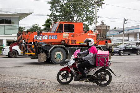 Chiangmai, Thailand -July 17 2021: Delivery service man ride a Motercycle of Food Panda. On road...