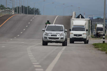 Chiangmai, Thailand - Auguest 15 2021: Private Isuzu Dmax Pickup Truck. On road no.1001 8 km from Chiangmai city.のeditorial素材