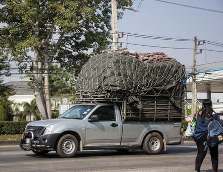 Chiangmai, Thailand - December 24 2021: Private Isuzu Dmax Pickup Truck. On road no.1001 8 km from Chiangmai city.のeditorial素材
