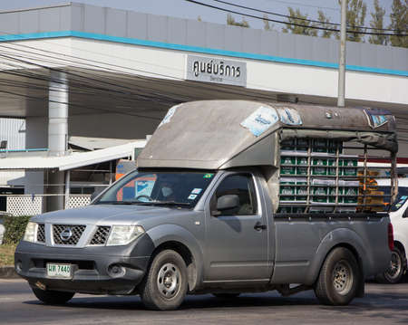 Chiangmai, Thailand - December 24 2021: Private Pickup car, Nissan Navara. On road no.1001, 8 km from Chiangmai Business Area.のeditorial素材