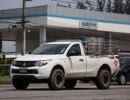 Chiangmai, Thailand - April  21 2022:  Private car, Mitsubishi Triton Pickup Truck. On road no.1001, 8 km from Chiangmai Business Area.のeditorial素材