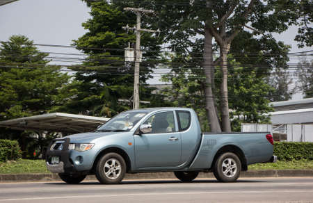 Chiangmai, Thailand - April  21 2022:  Private car, Mitsubishi Triton Pickup Truck. On road no.1001, 8 km from Chiangmai Business Area.のeditorial素材