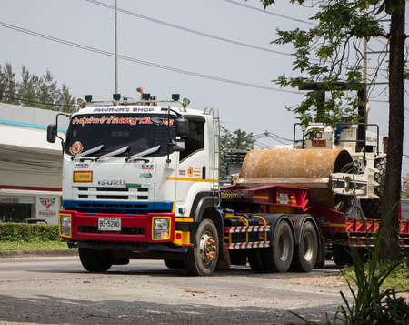 Chiangmai, Thailand - April  21 2022:  Trailer Dump Truck and Sakai Tire roller  of Payawan Transport Company. Photo at road no.121 about 8 km from downtown Chiangmai, thailand.のeditorial素材