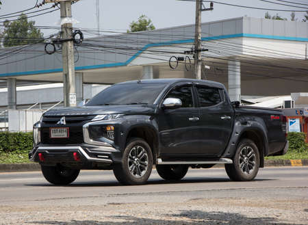 Chiangmai, Thailand - April  21 2022: Private car, Mitsubishi Triton Pickup Truck. On road no.1001, 8 km from Chiangmai Business Area.のeditorial素材