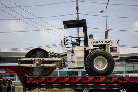 Chiangmai, Thailand - April  21 2022: Private Ingersoll Rand SD-100D asphalt roller on truck. On road no.1001, 8 km from Chiangmai city.のeditorial素材