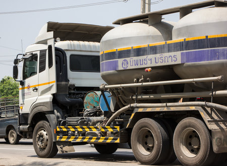 Chiangmai, Thailand - April  22 2022: Cement Truck of Lampang Niphon company.  On road no.1001, 8 km from Chiangmai city.のeditorial素材