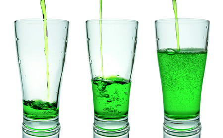 Pour into a glass and greenの写真素材