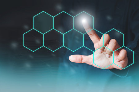 The man shows the gesture of pointing touching on the virtual screen and has a beehive screen...