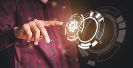 The hands of business people are touching the technology of the future on black backdrop.  There is space for copy space. Future technology concept. concept idea, concept innovation.の写真素材