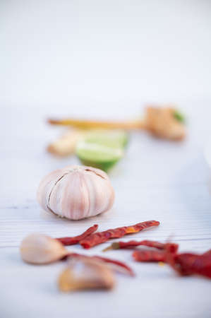 White soup cup with side dishes placed on a white background.の写真素材