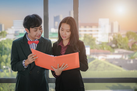 people work together as a team within the office. Gender diversity concept, business concept, teamwork concept.の写真素材