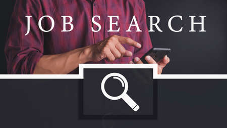 Businessman clicks on the Internet job search page on a computer touch screen, Networking Concept, Virtual Screen Concept.の写真素材