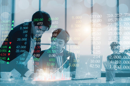 Double exposure: Businessmen point a line at the virtual screen. With men working on computers...