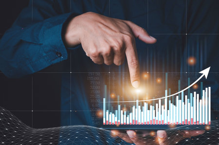 Businessman hand show Stock chart showing rising stock sign with graph indicator. Interest rate financial and mortgage rates concept. Double Exposure Image.の写真素材