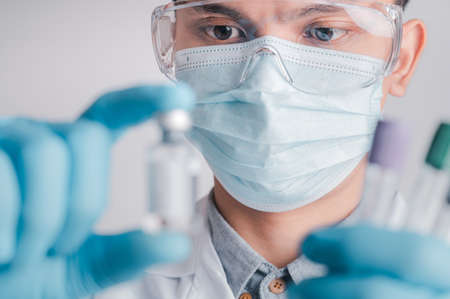 Doctors wear a surgical mask and glasses, Scientistsの写真素材