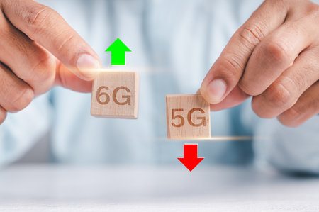 Wooden cube handle to turn 5G into 6G  (6th Generation), technology turns the transition to high speed and the Internet of things.の写真素材
