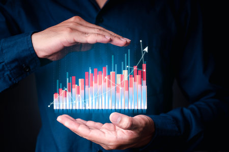 Businessman hand show Stock chart showing rising stock sign with graph indicator. Interest rate financial and mortgage rates concept. Double Exposure Image.の写真素材