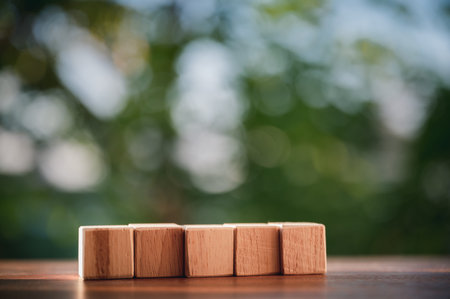 Wood block is arrange row put up on the table show concepts and strategy of business with natural...