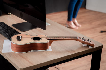 Asian female singer with a passion for music and microphone. While playing her guitar in a...