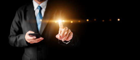 Businessman hand show Stock chart showing rising stock sign with graph indicator. Interest rate financial and mortgage rates concept. Double Exposure Image. Blue technology background high tech.の写真素材